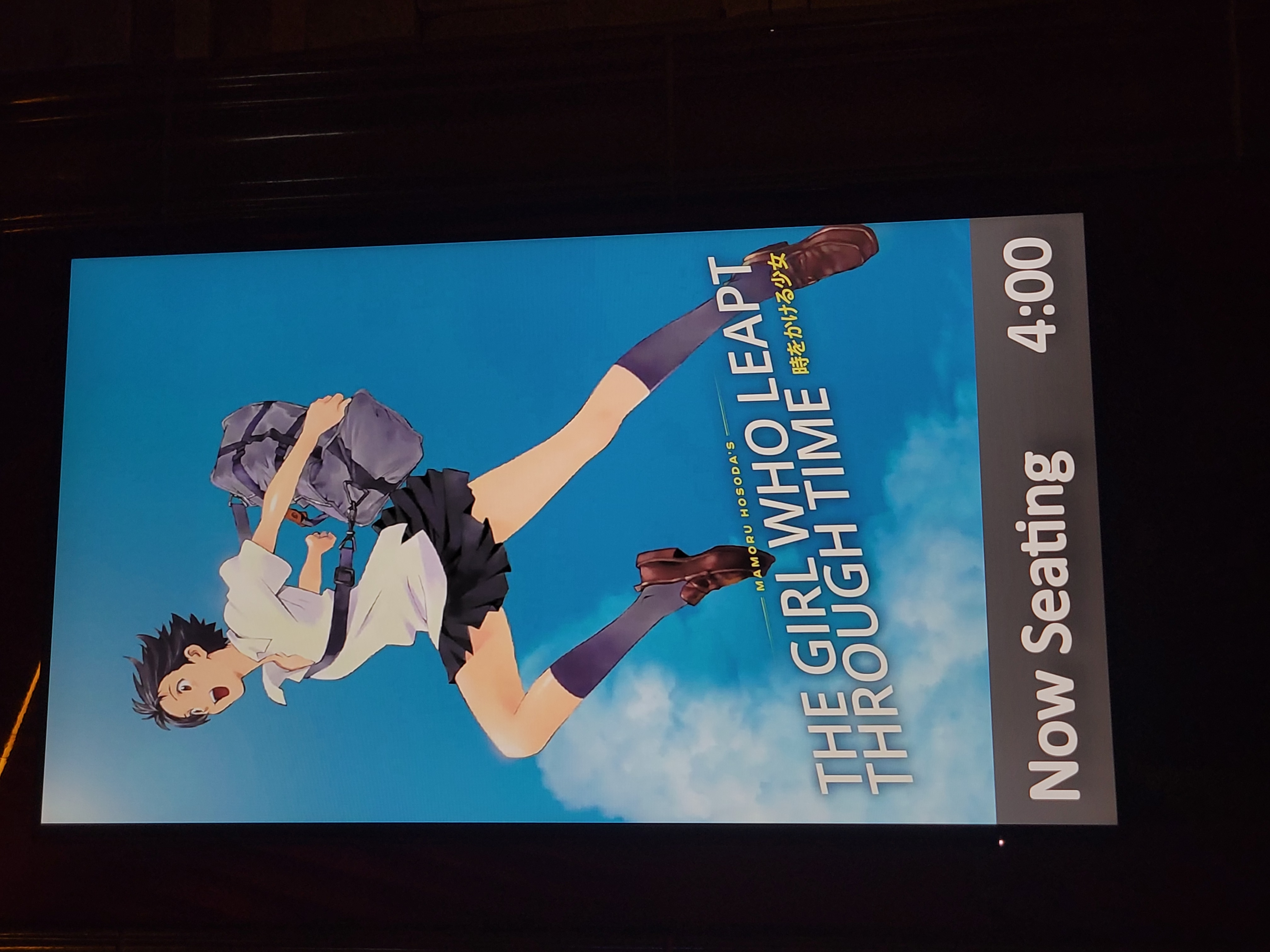 Screen displaying information for the movie The Girl Who Leapt Through Time and that it was seating at 4:00.
